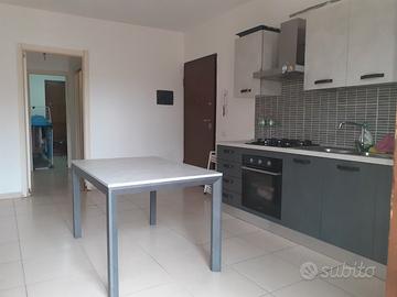 Trivano con cortile e posto auto