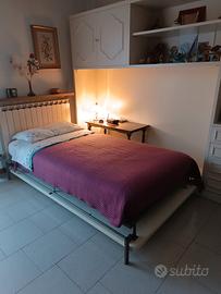 letto a scomparsa nel mobile bianco 