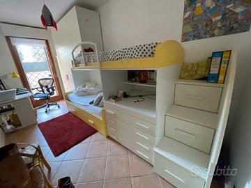 letto a castello con armadi e scrivania
