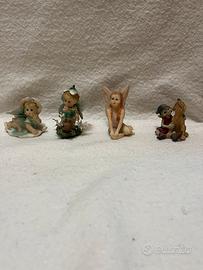 4 statuette in ceramica