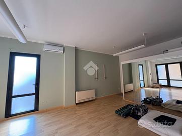 MULTILOCALE A SUZZARA