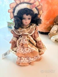 Bambola da collezione in porcellana Magic sun