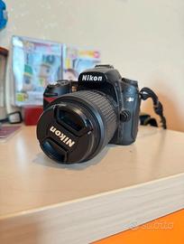 Nikon D90 + 18-105mm + 55-200mm + SD 16GB
