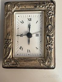 Orologio in cornice argento