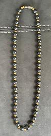Collana con perle nere e oro