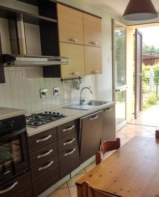 Porzione di casa con giardino privato