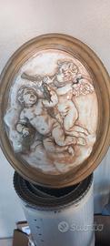 Bassorilievo con putti in gesso ceramico