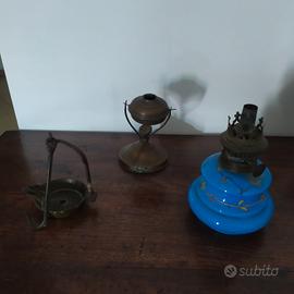 serie di antiche lampade di materiali diversi 