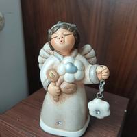 angelo con ciondolo thun