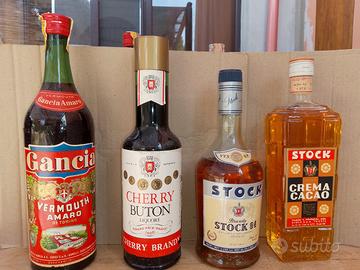 collezione  vintage 8 bottiglie liquore 