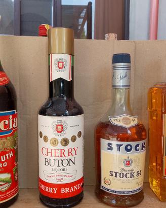 collezione  vintage 8 bottiglie liquore 