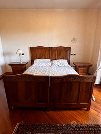 Letto con comodini e comò
