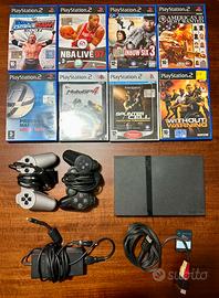 PlayStation 2 Slim + 2 Joypad + 8 Giochi + 1 Card