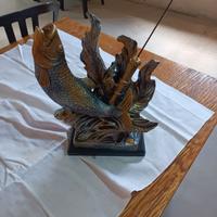 soprammobile vintage con pesce e canna da pesca 