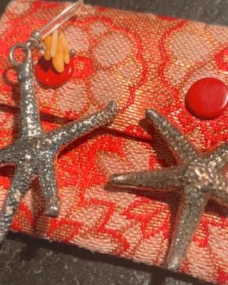 Orecchini con stelle marine in bagno d’argento