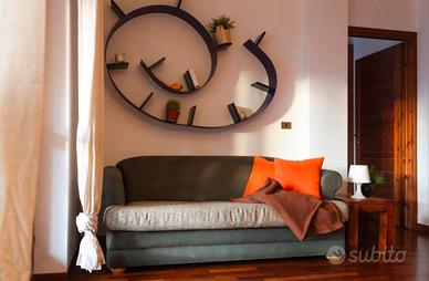 Divano letto apribile bicolore matrimoniale