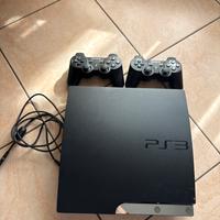 Playstation 3 con 2 joystick e un cavo