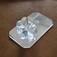 statuina Swarovski a forma di quadrifoglio