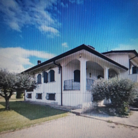 Casa più una porzione di un palazzo