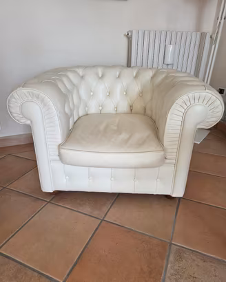 poltrona capitonné in vera pelle