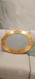 specchio ovale in legno e foglia oro