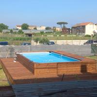 Piscina intex 366 x 732  rivestita in legno