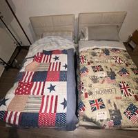 Due letti singoli a contenitore