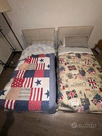 Due letti singoli a contenitore