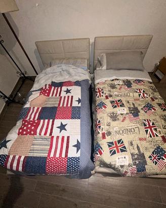 Due letti singoli a contenitore