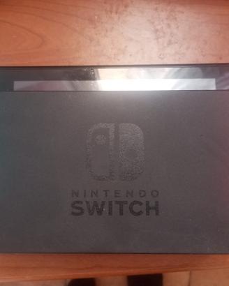 Nintendo switch con un gioco(trattabile)