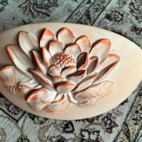 Applique in ceramica