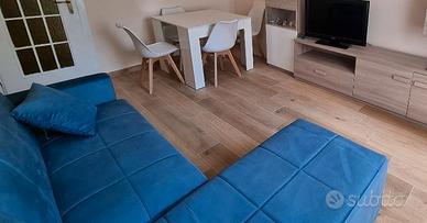 Divano letto angolare con penisola reversibile