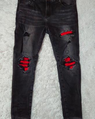 jeans Amiri con patch di velluto rosse taglia 32.