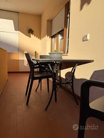 Tavolo da giardino in pietra e ferro battuto