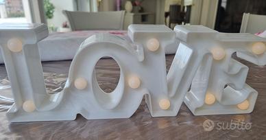 Lampada arredo luce, Love, nuova, da 39 a 10 euro