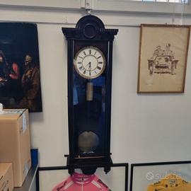 Orologio a pendolo tardo 800 con smalti e ottoni