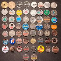 58 gettoni esteri in metallo tutti diversi