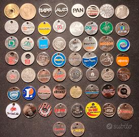 58 gettoni esteri in metallo tutti diversi