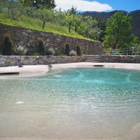Bilocale con giardino e uso piscina (2/4 pers)