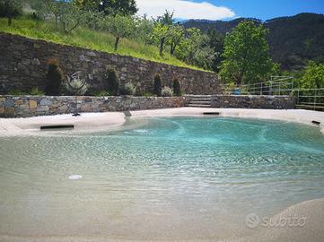 Bilocale con giardino e uso piscina (2/4 pers)