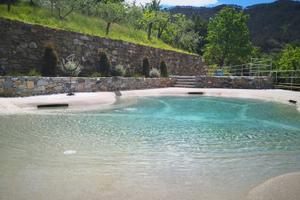 Bilocale con giardino e uso piscina (2/4 pers)