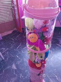 colonna di plastica trasparente vari peluches 