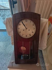 raffinato orologio a pendolo 
