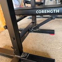 panca piana pieghevole con manubri e bilanciere