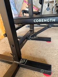 panca piana pieghevole con manubri e bilanciere