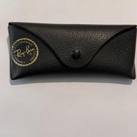 Occhiali Ray Ban grigio fumo.