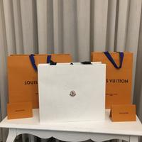 Due buste Louis Vuitton e una Moncler