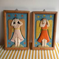 Coppia di angeli scolpiti nel legno