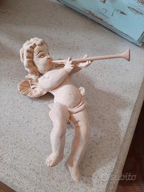 Angiolino in legno intagliato grezzo