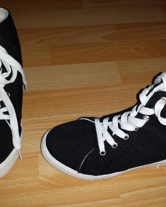 Scarpe con rialzo interno